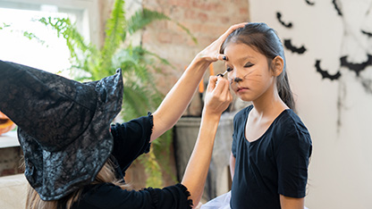 makeup being applied for fancy dress